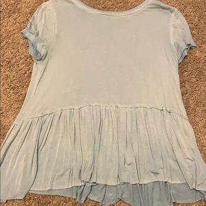 Light blue ruffled shirt